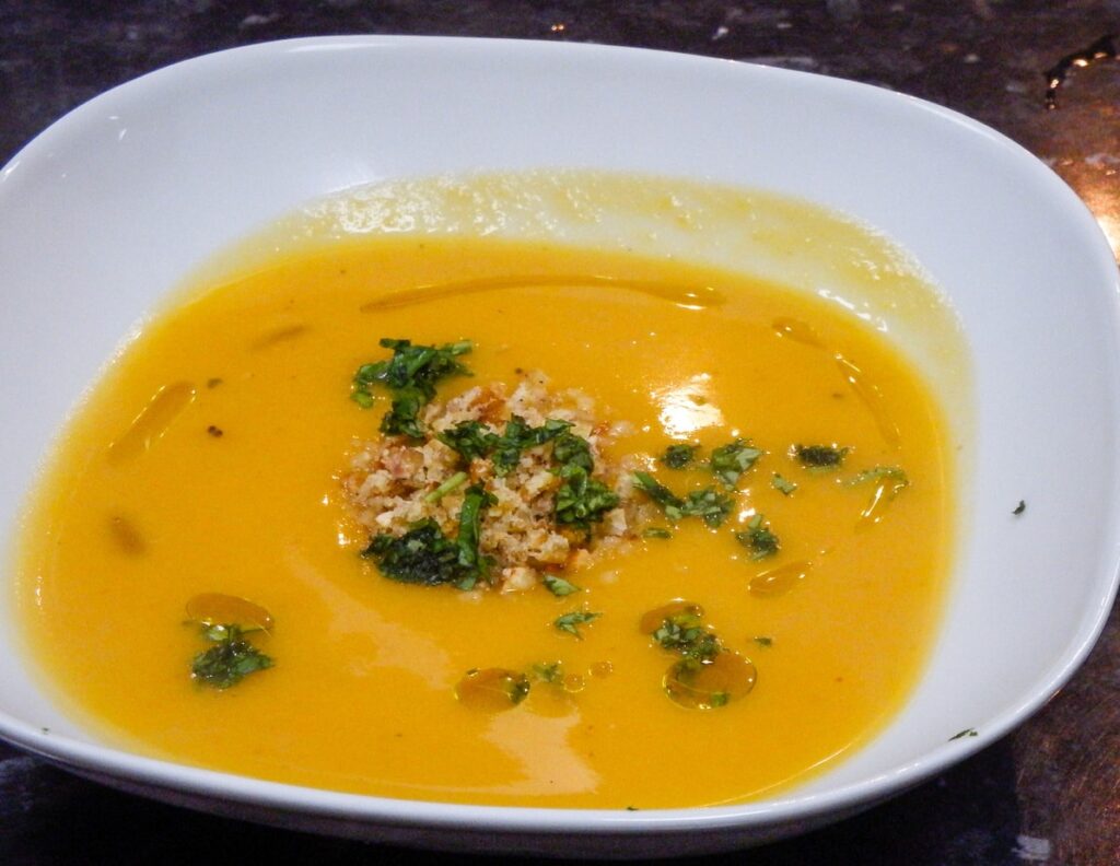“Bowl of roasted squash and chestnut soup served during a Lisbon cooking class