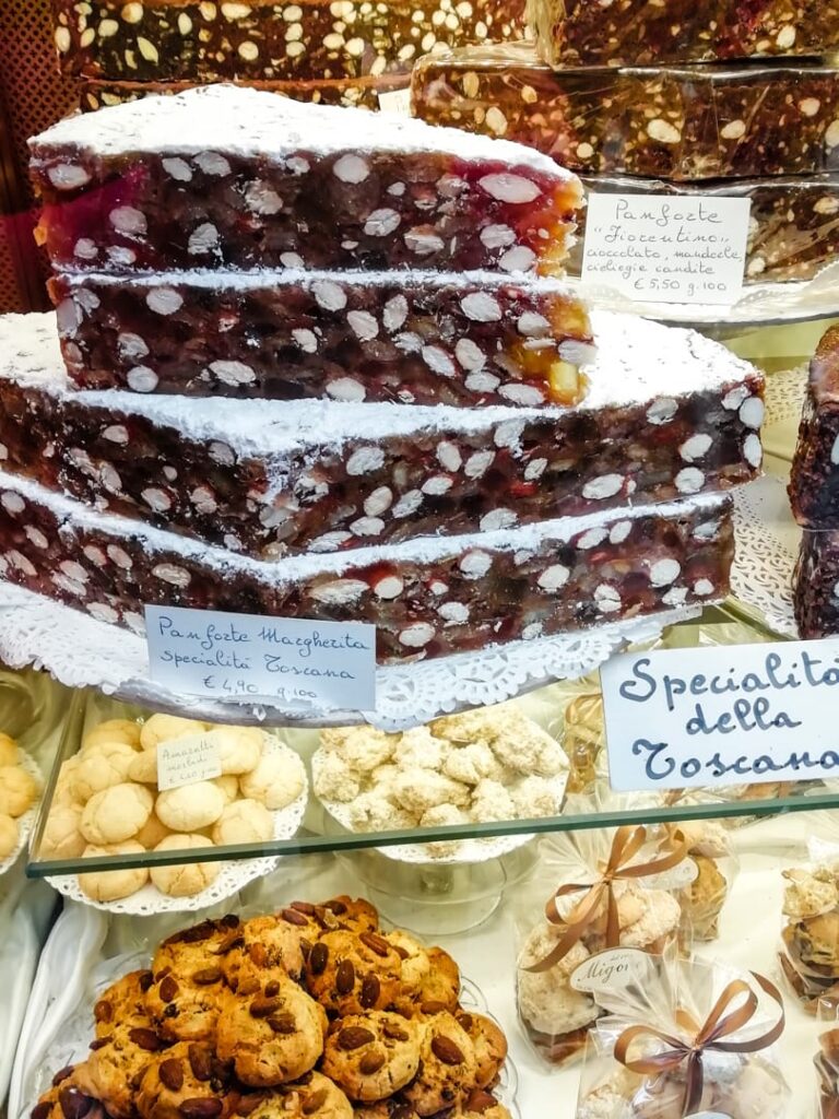 t: Selection of traditional Tuscan sweets and local specialties in a Florence food shop