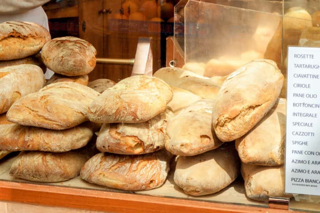 “Fresh bread at Mercato Testaccio in Rome, best area to stay in Rome for foodies
