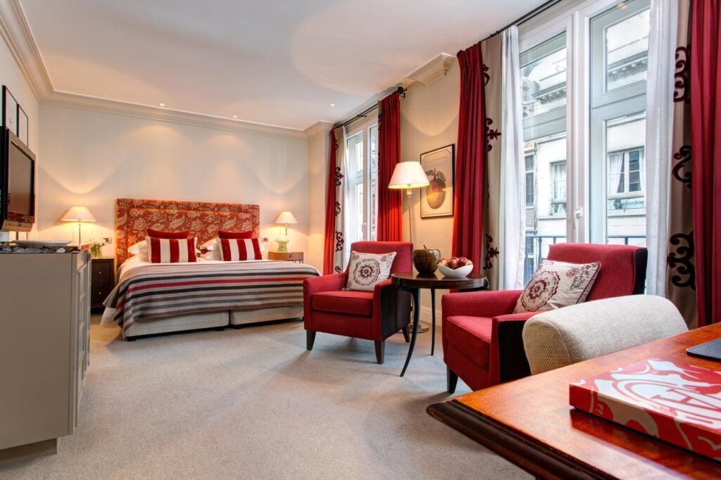 Elegant room at Rocco Forte Hotel Amigo Brussels with plush décor near the Grand Place