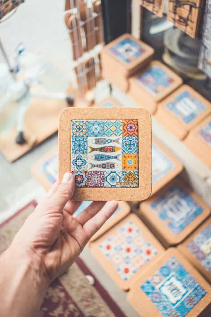 Colourful ceramic tile coasters with traditional Lisbon azulejo patterns and cork backing.
