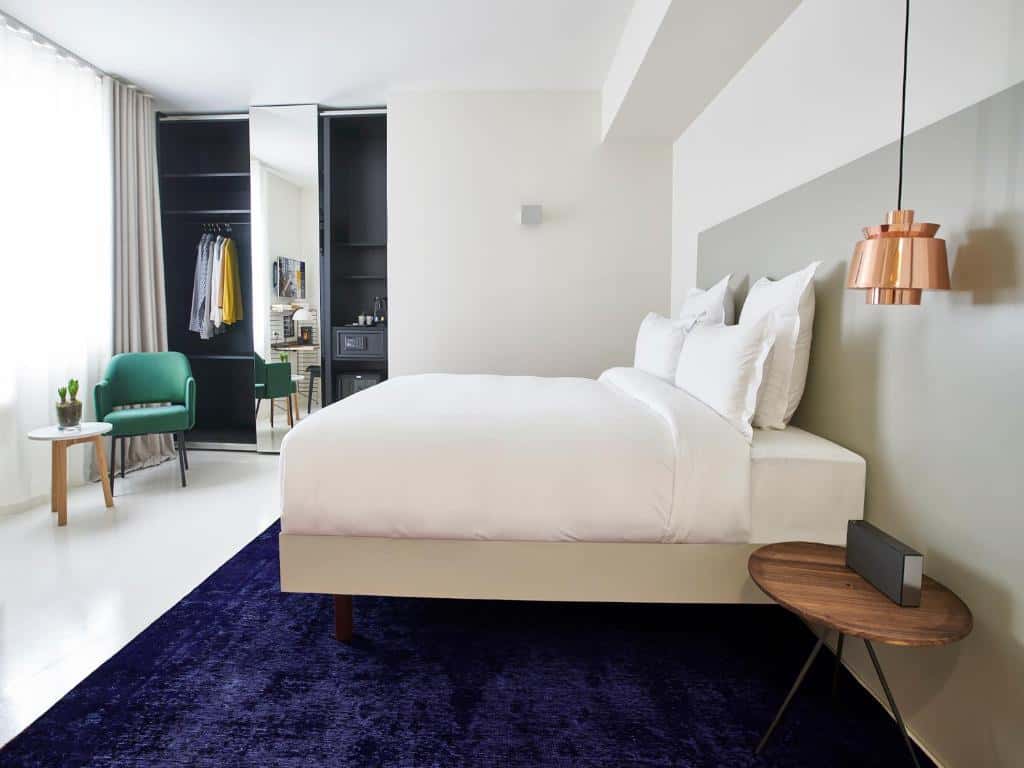 Stylish boutique room at 9Hotel Sablon Brussels with modern design and cosy details