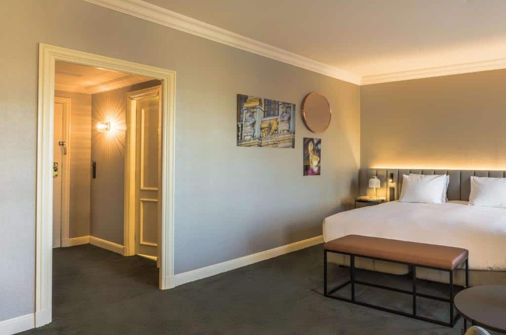 Modern guest room at Hilton Brussels Grand Place overlooking the city square