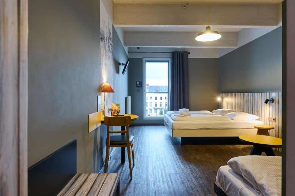 Colourful room at Meininger Hotel Brussels City Center in former brewery building