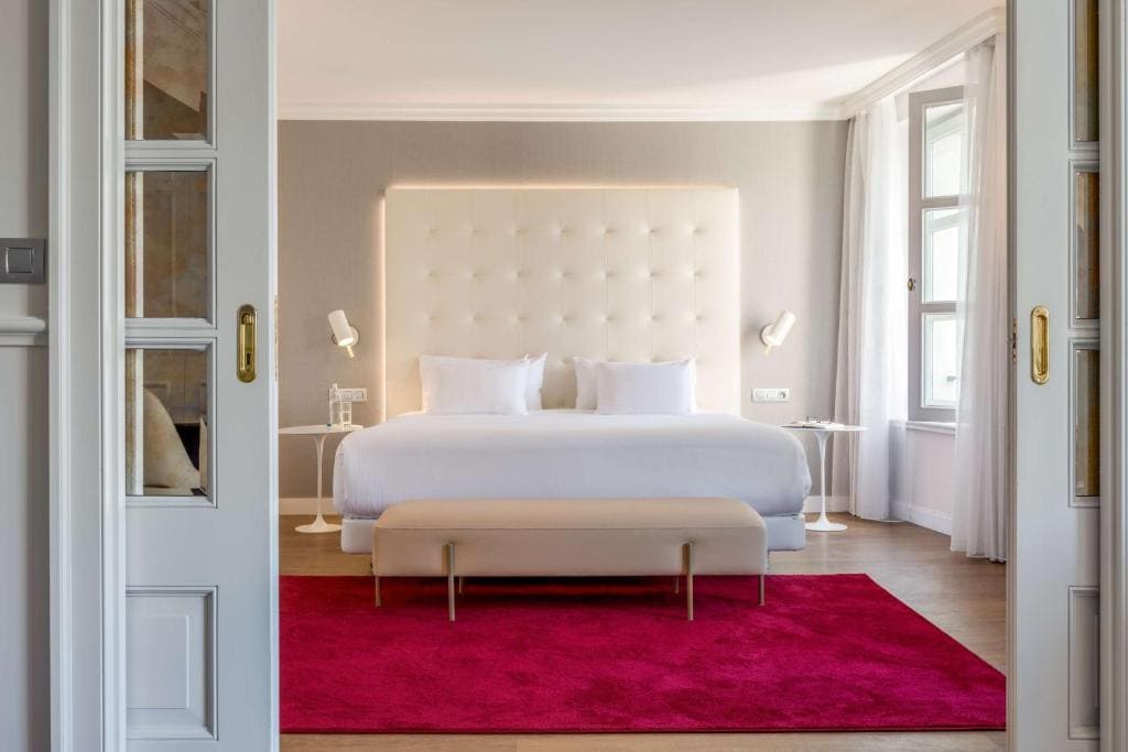 Modern guest room at NH Collection Brussels Grand Sablon overlooking the square