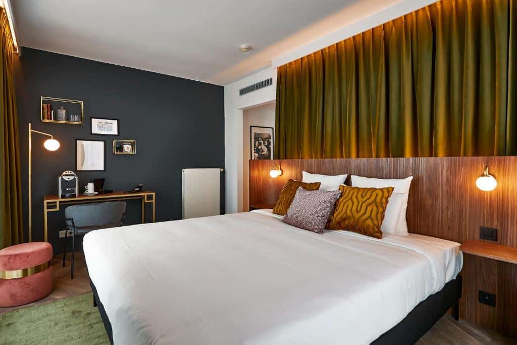 Contemporary room at The Scott Hotel Brussels with minimalist décor and warm tones
