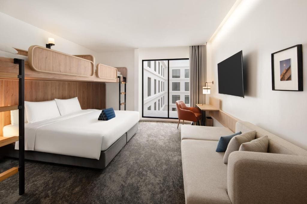 Modern boutique bedroom at ASAI Bangkok Chinatown with minimalist design