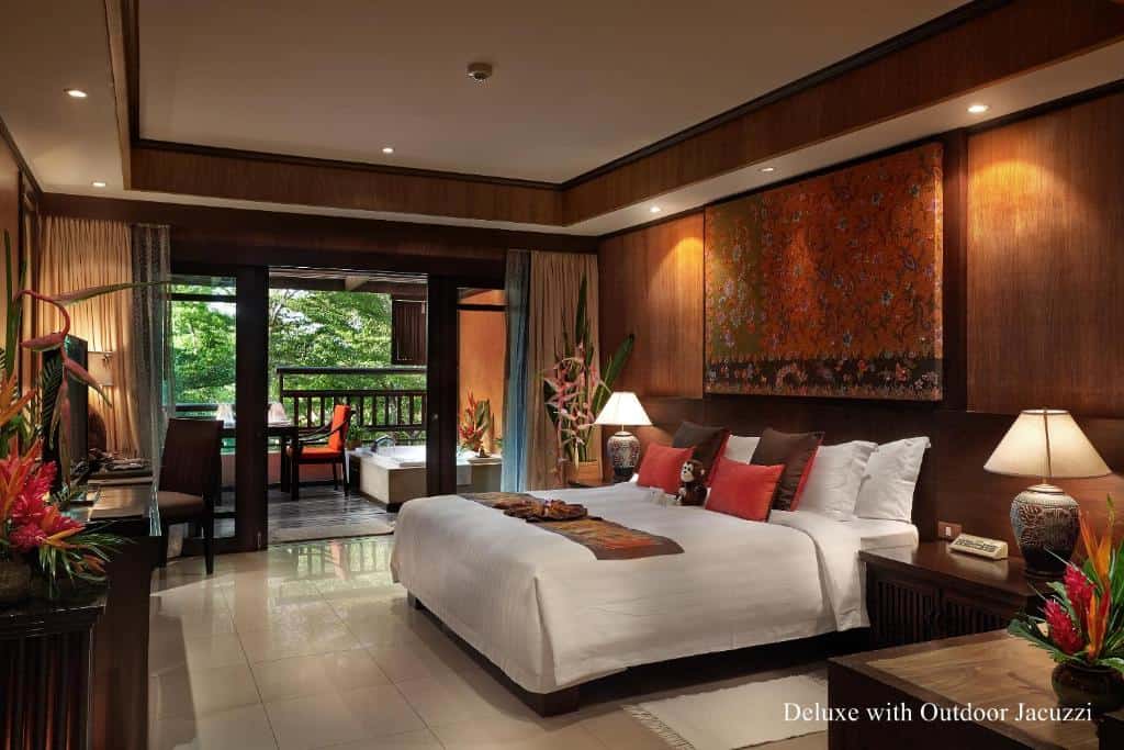Elegant garden villa bedroom with balcony at Bo Phut Resort Koh Samu