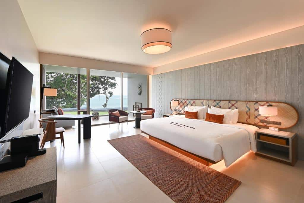 “Romantic villa bedroom with Balinese-style décor at Rocky’s Koh Samui