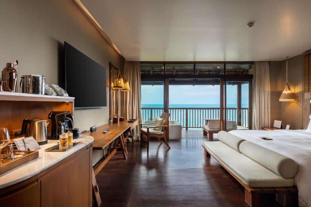 Luxury villa bedroom with ocean views at Silavadee Pool Spa Resort