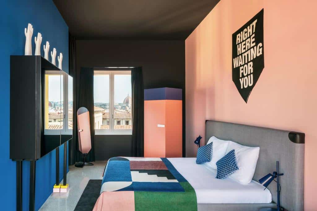 Trendy bedroom with modern furnishings and playful hints