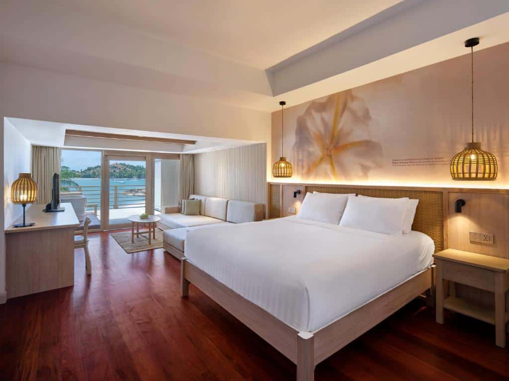 Eco-luxe villa bedroom surrounded by greenery at Tongsai Bay Samui
