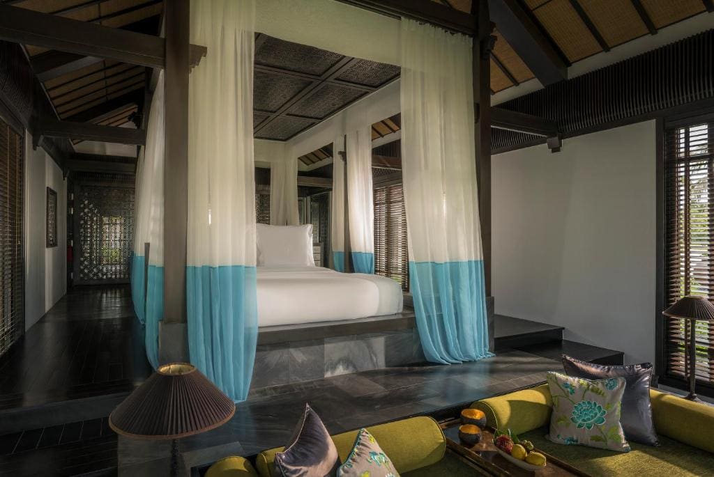 Luxury villa bedroom with private plunge pool and beachfront views in Hoi An.