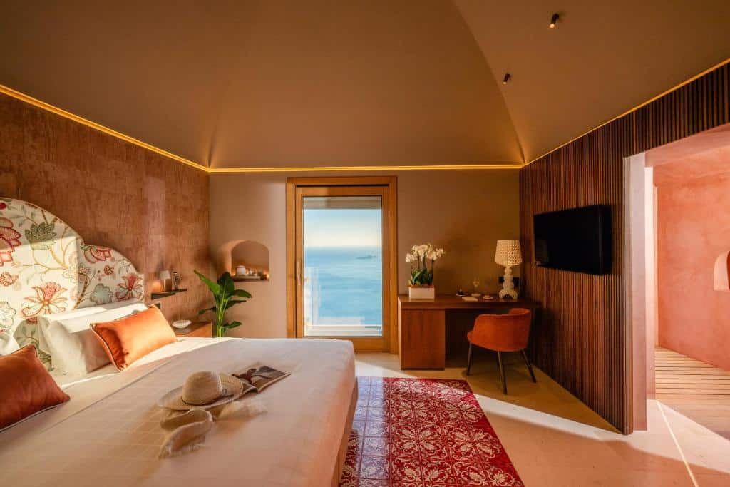 Junior Suite at Antalia Boutique Hotel in Montepertuso with sea views from the bedroom