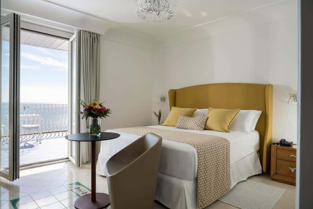 Spacious sea-view bedroom at Eden Roc Positano with terrace
