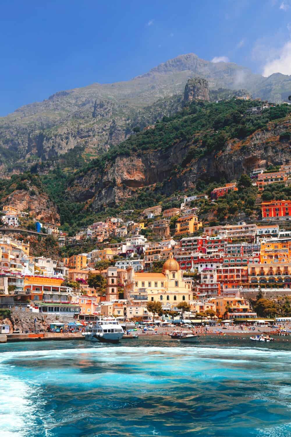 Colourful hillside buildings above the beach in Positano on the Amalfi Coast