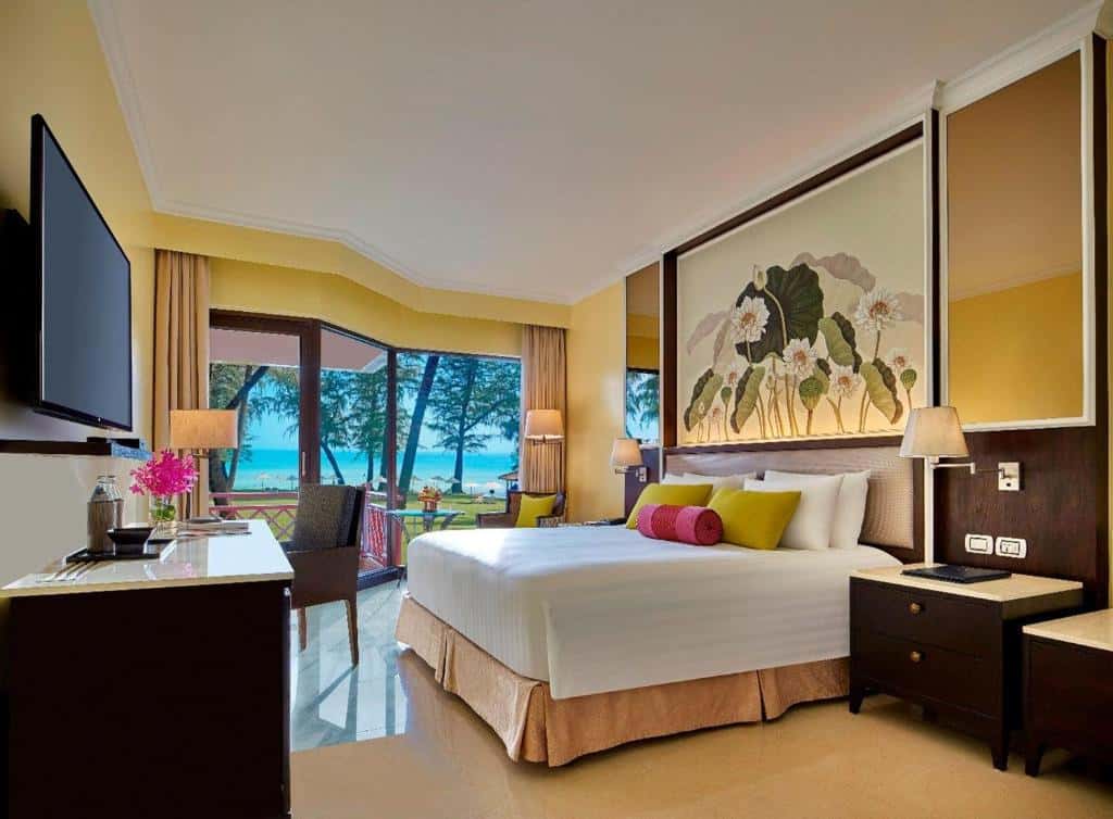 Dusit Thani Laguna Phuket beachfront room with ocean views overlooking Bang Tao Beach and tropical gardens